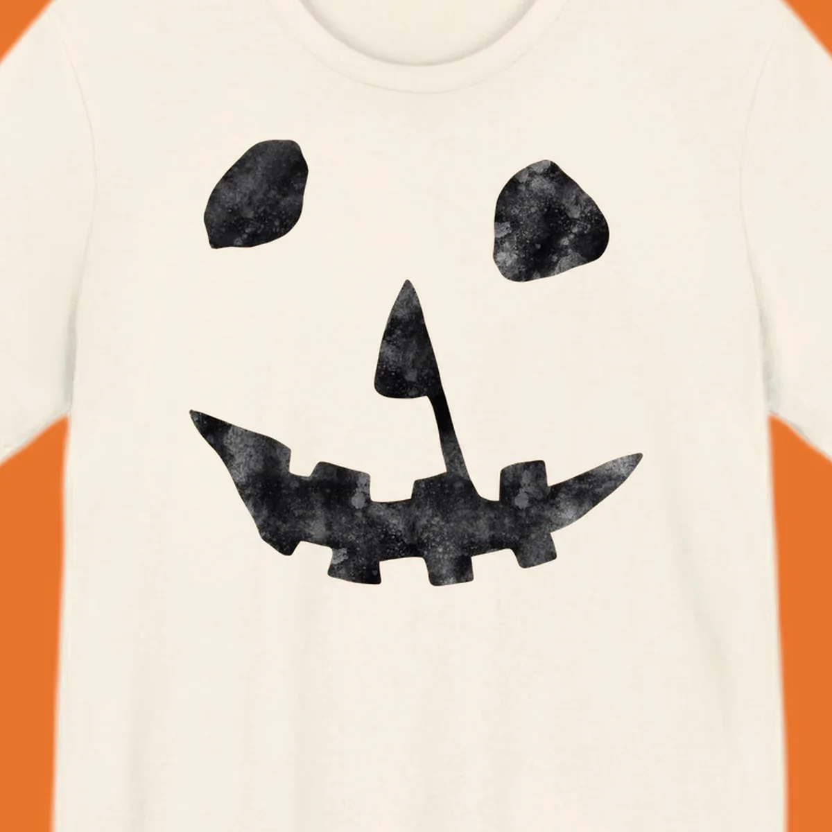 Spooky jack o lantern face graphic with distressed texture for Halloween.