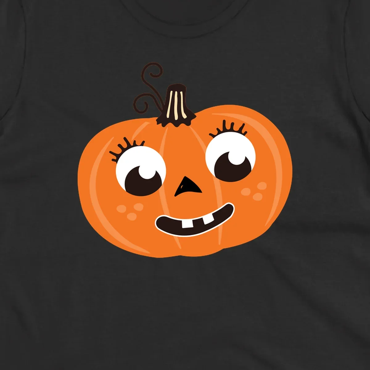 Cute halloween pumpkin face graphic with big eyes and a smile.