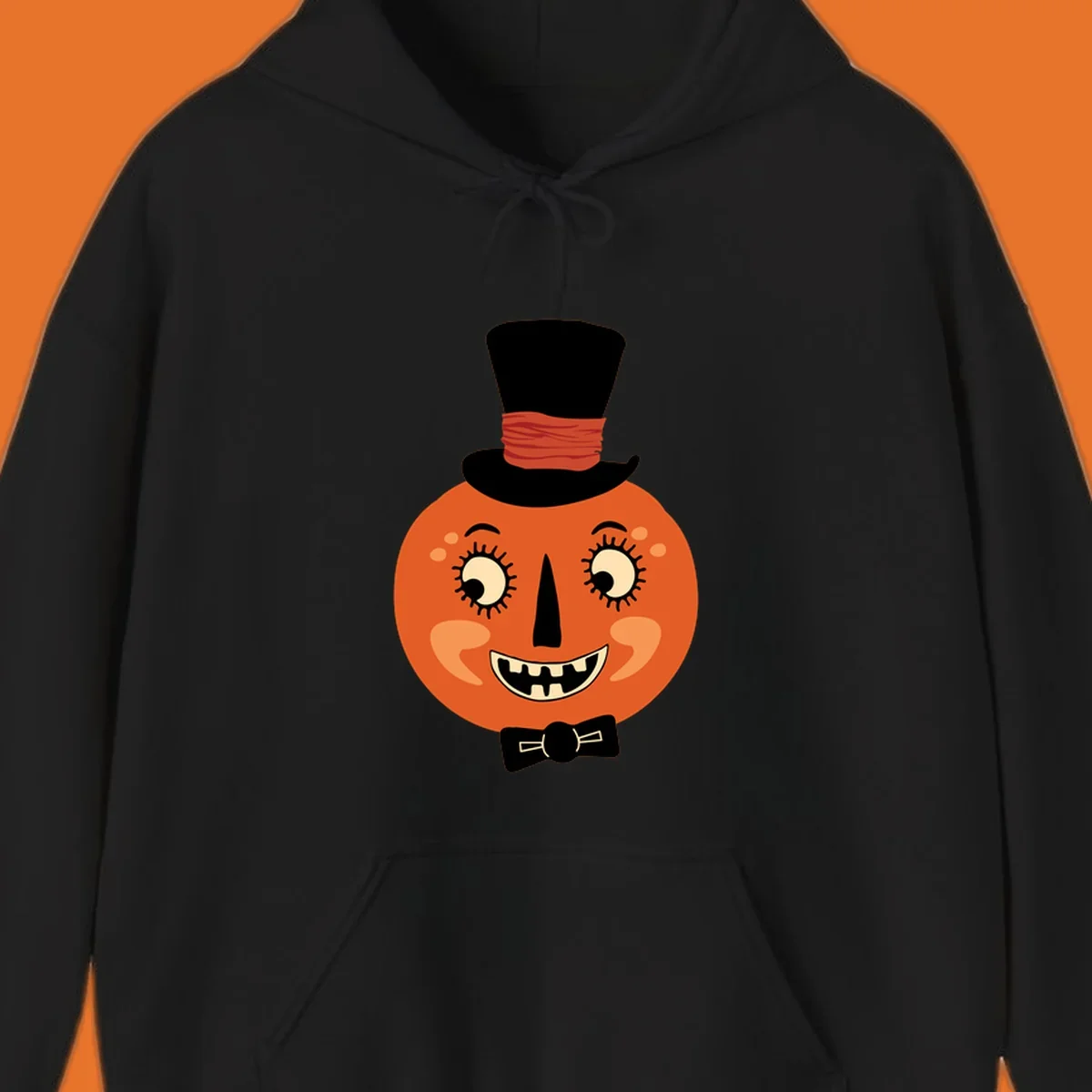 Dapper pumpkin character wearing a top hat and bow tie, with a friendly face.