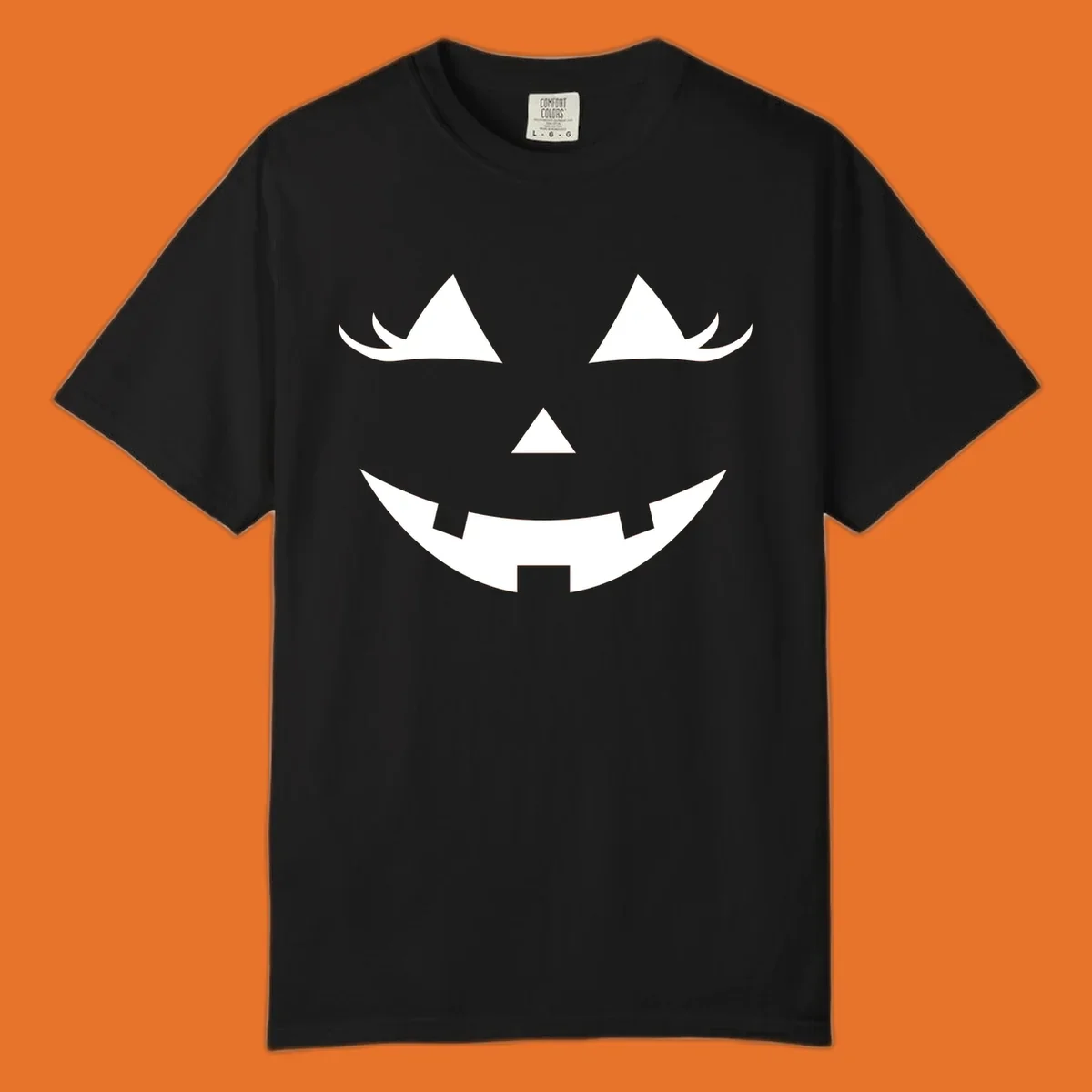 Spooky grinning jack-o-lantern face with triangle eyes and jagged smile, graphic for halloween.