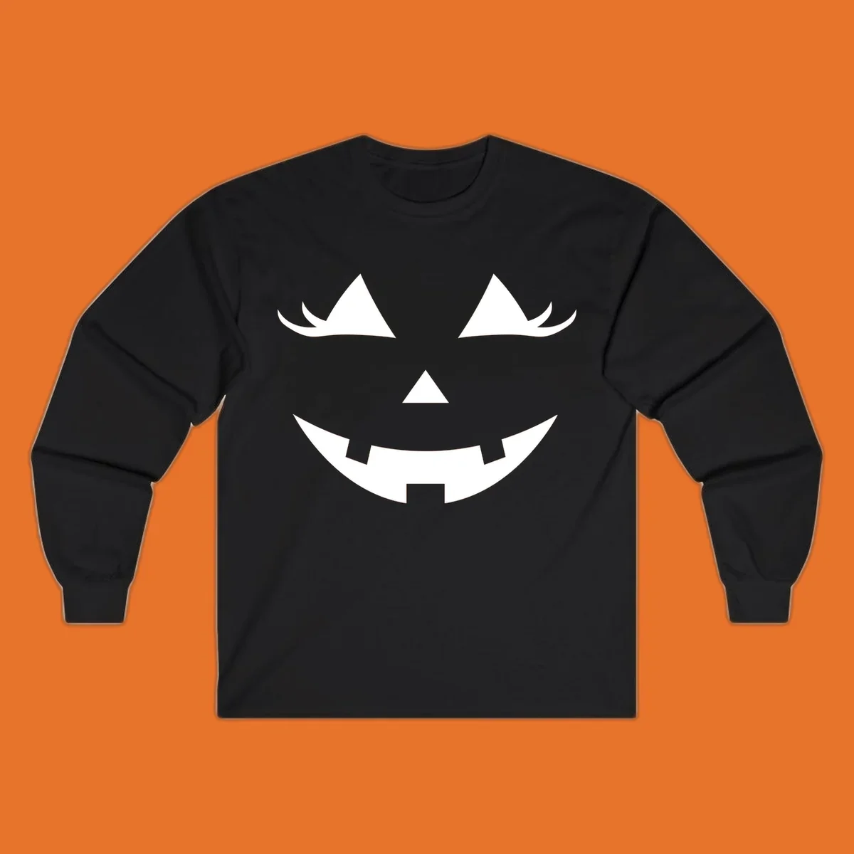 Spooky grinning jack-o-lantern face with triangle eyes and jagged smile, graphic for halloween.