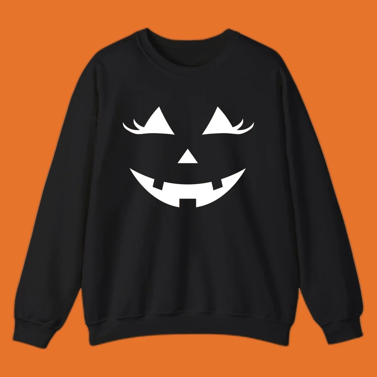 Spooky grinning jack-o-lantern face with triangle eyes and jagged smile, graphic for halloween.
