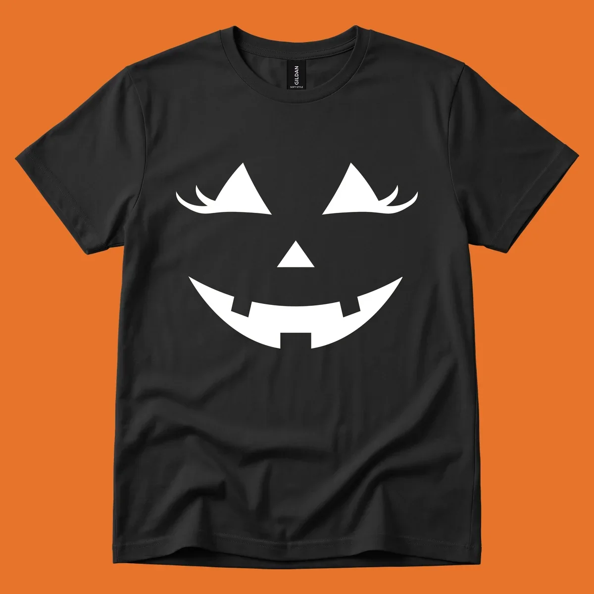 Spooky grinning jack-o-lantern face with triangle eyes and jagged smile, graphic for halloween.