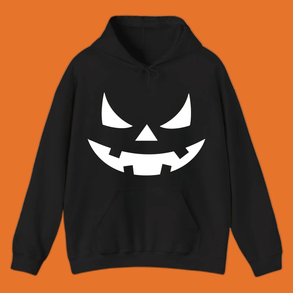 Spooky jack-o-lantern face illustration with angled eyes and jagged smile, for Halloween.