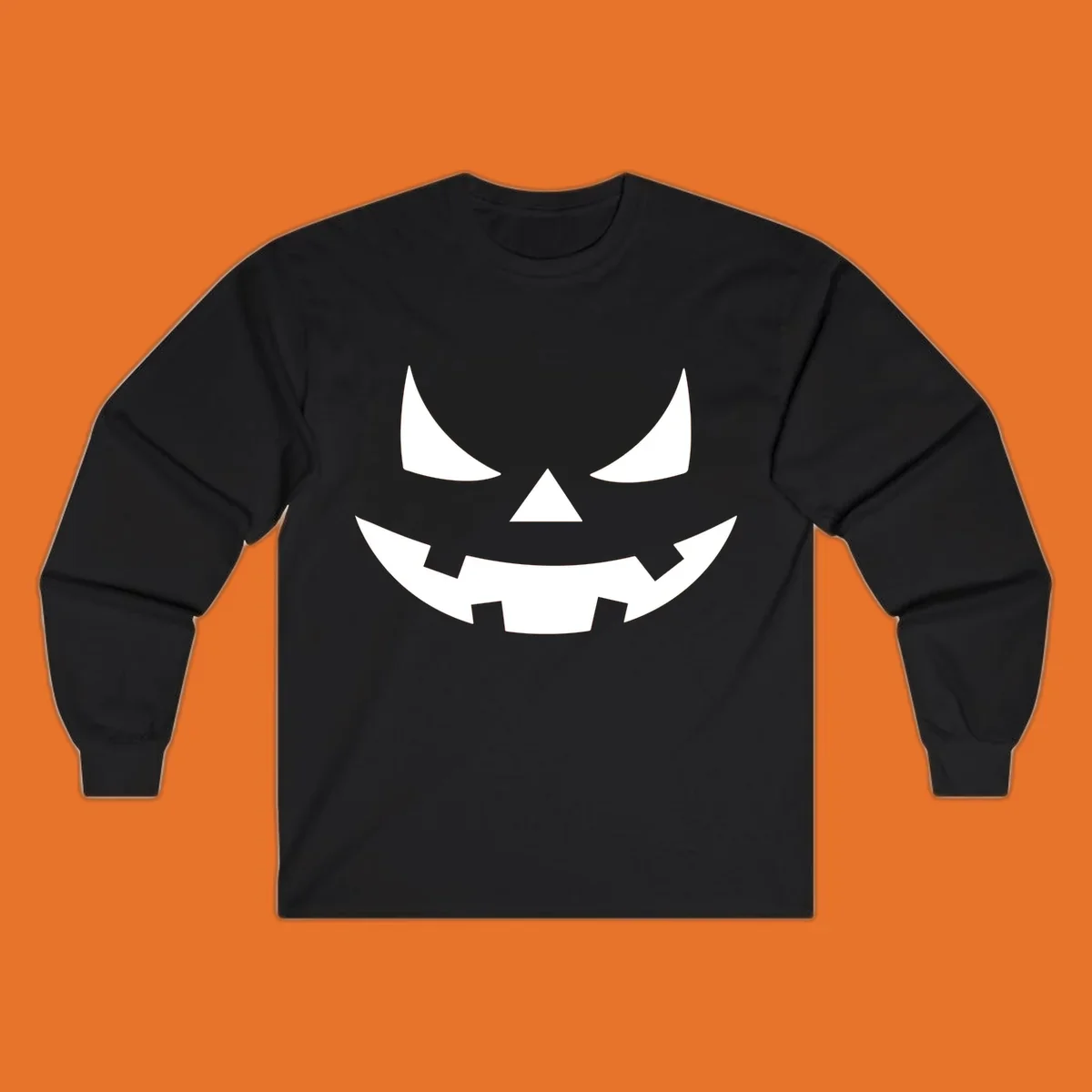 Spooky jack-o-lantern face illustration with angled eyes and jagged smile, for Halloween.