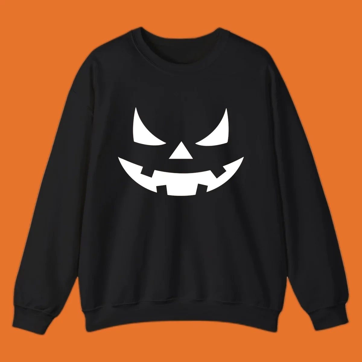 Spooky jack-o-lantern face illustration with angled eyes and jagged smile, for Halloween.
