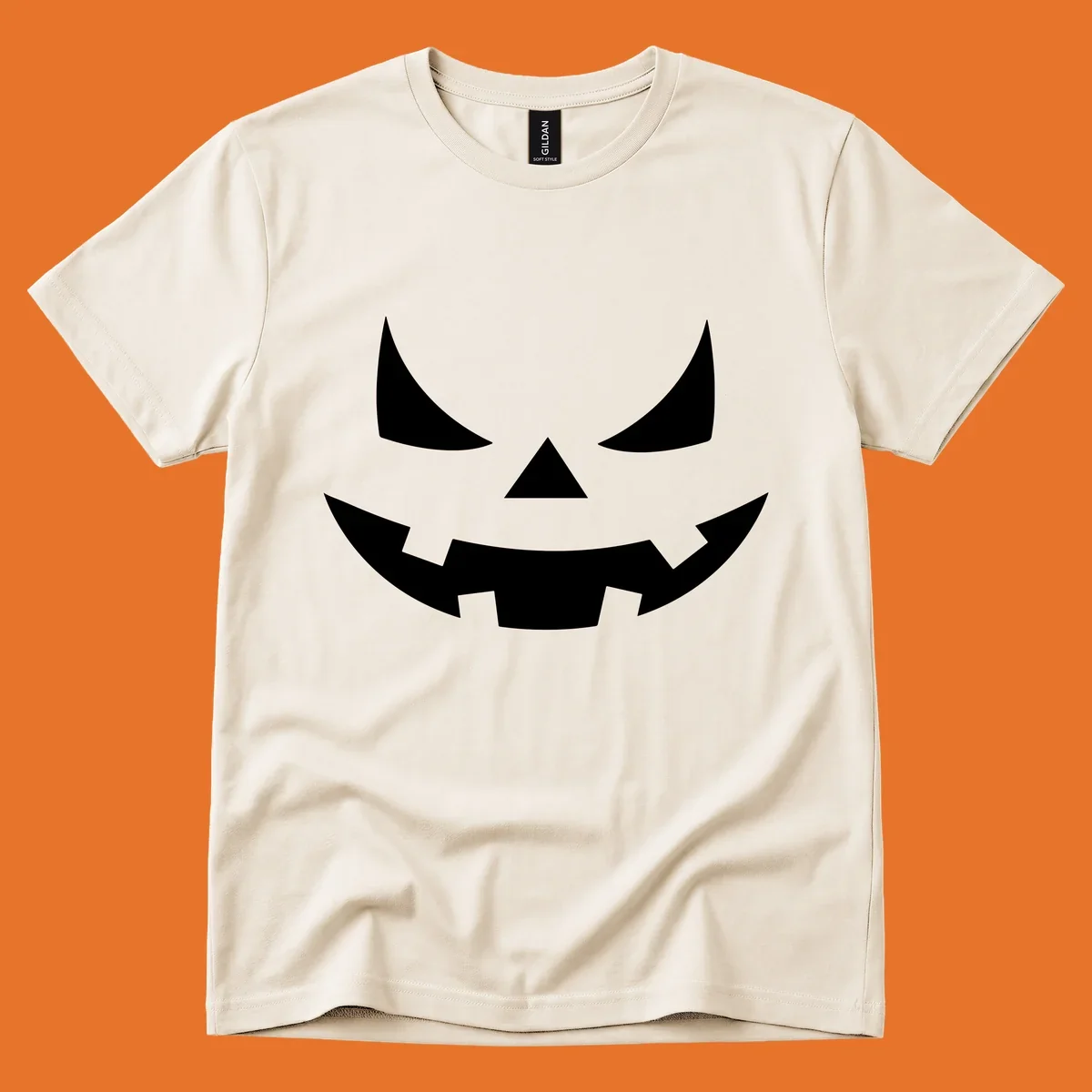 Spooky jack-o-lantern face illustration with angled eyes and jagged smile, for Halloween.