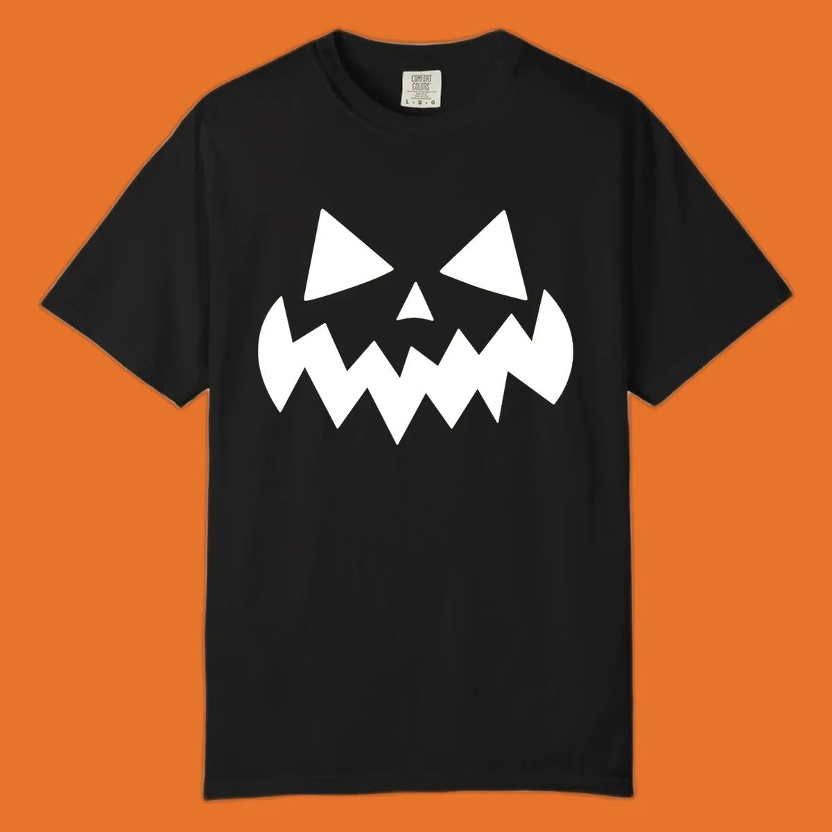 Spooky jack-o-lantern face with triangular eyes and a jagged mouth graphic.