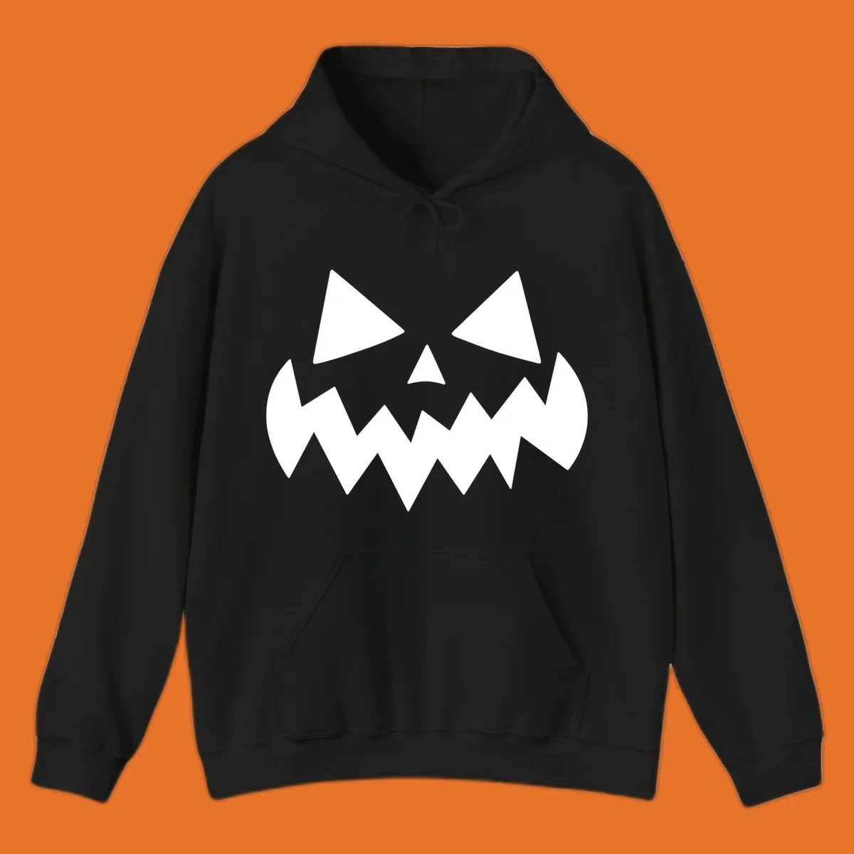 Spooky jack-o-lantern face with triangular eyes and a jagged mouth graphic.