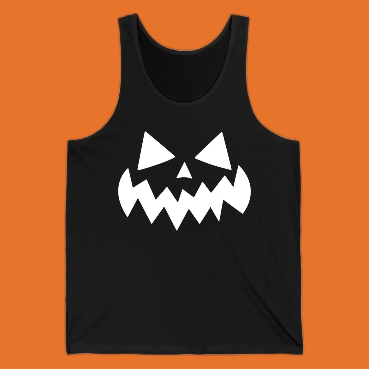 Spooky jack-o-lantern face with triangular eyes and a jagged mouth graphic.