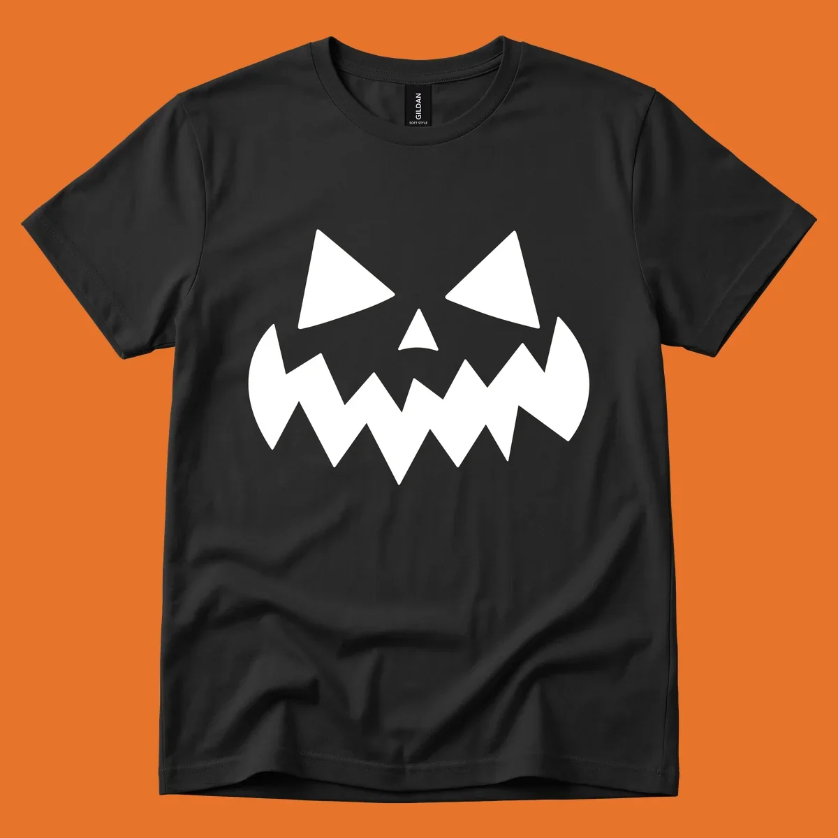 Spooky jack-o-lantern face with triangular eyes and a jagged mouth graphic.