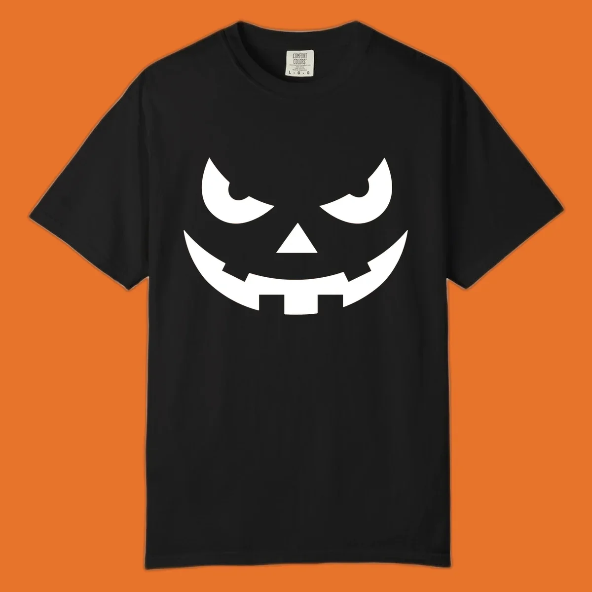 Spooky pumpkin face graphic with sharp eyes and a jagged grin.
