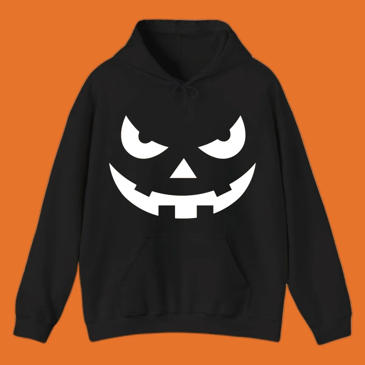 Spooky pumpkin face graphic with sharp eyes and a jagged grin.