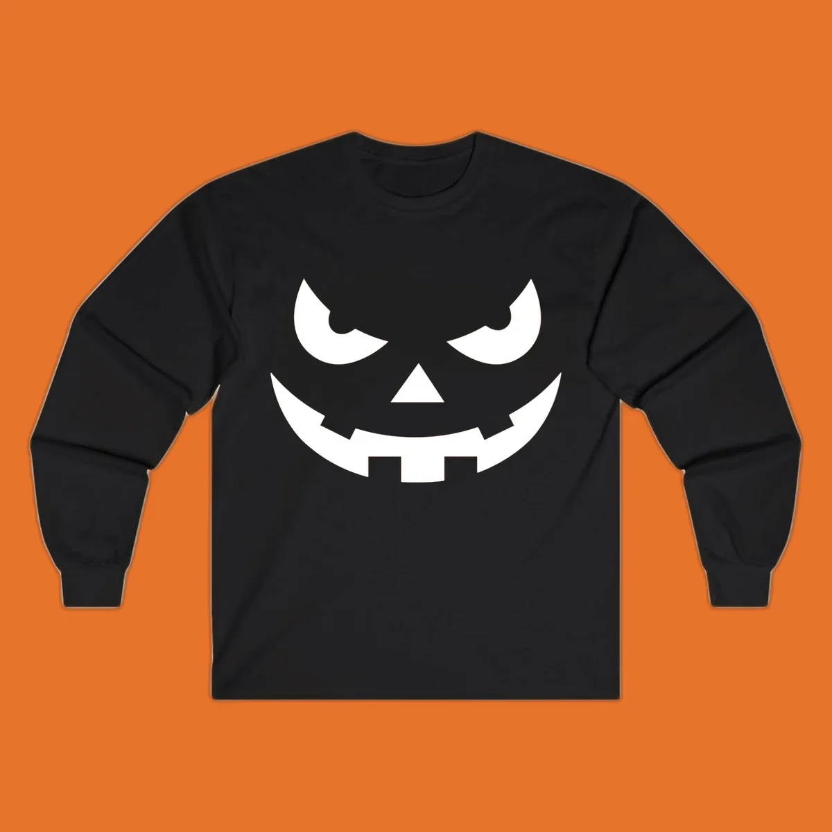 Spooky pumpkin face graphic with sharp eyes and a jagged grin.