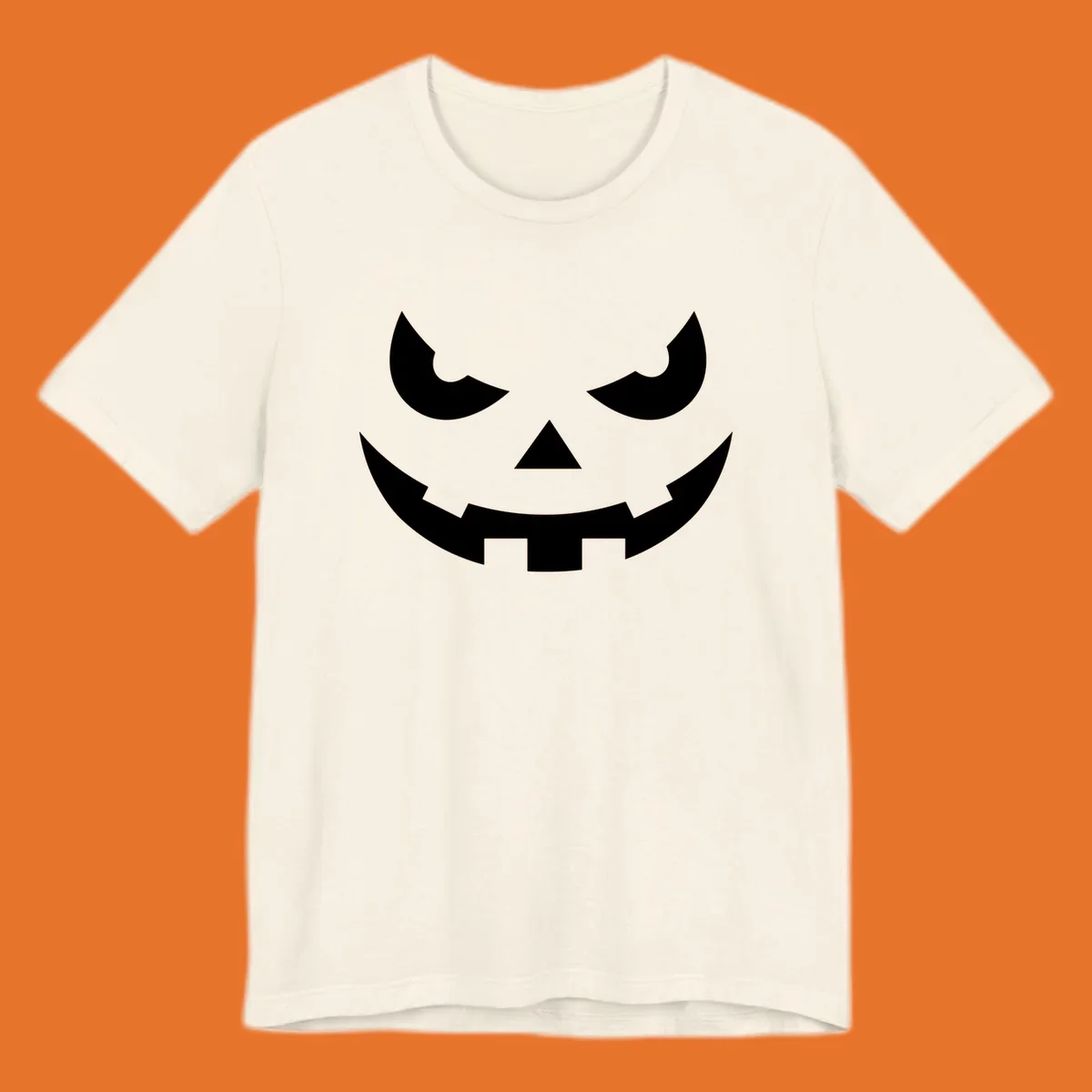 Spooky pumpkin face graphic with sharp eyes and a jagged grin.