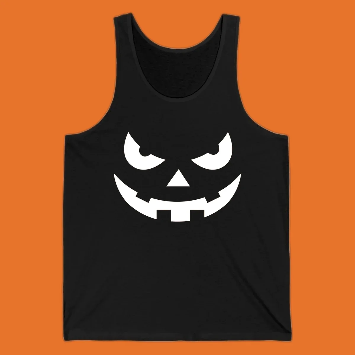 Spooky pumpkin face graphic with sharp eyes and a jagged grin.