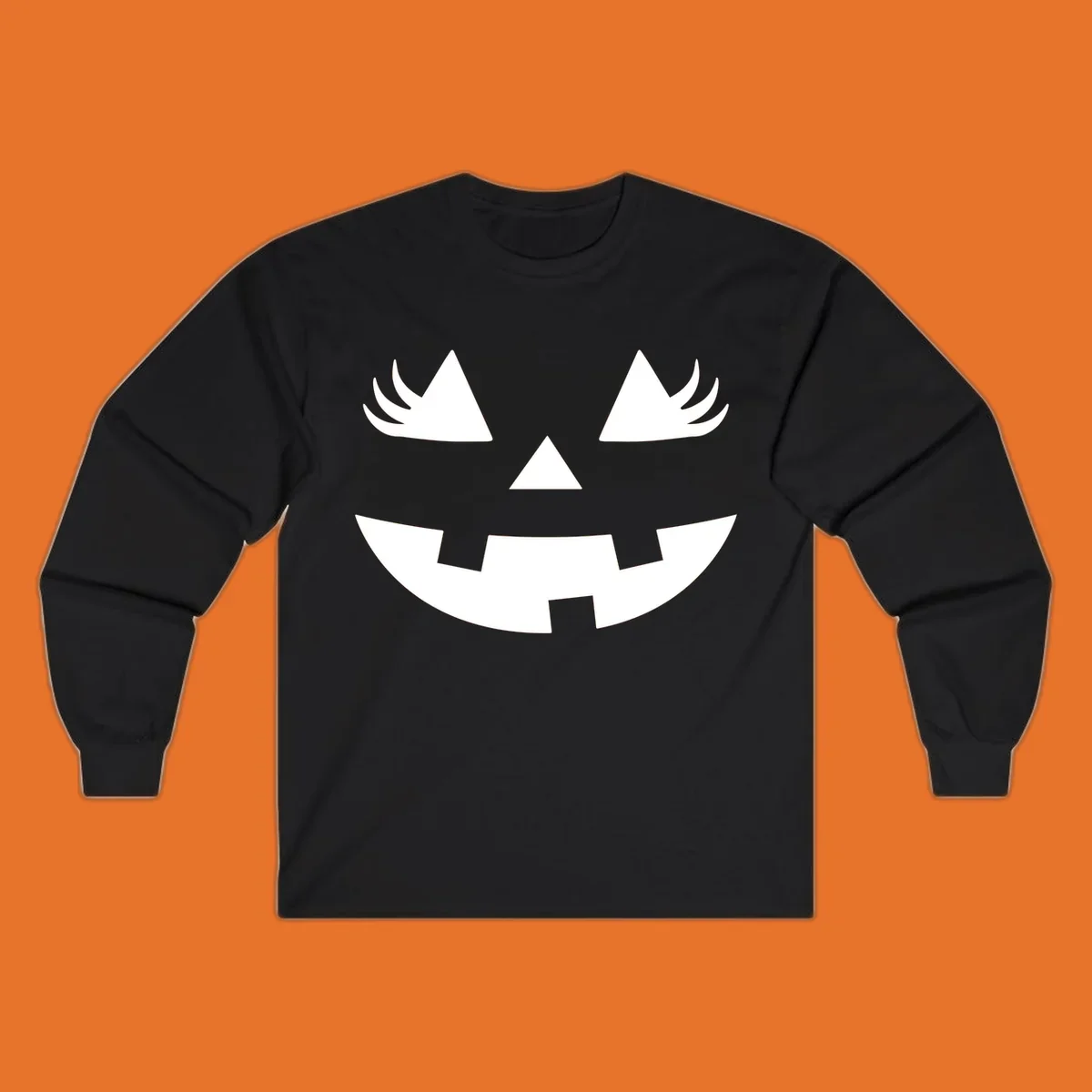 Jack o' lantern face with triangle eyes, nose, and jagged smile, featuring eyelashes.