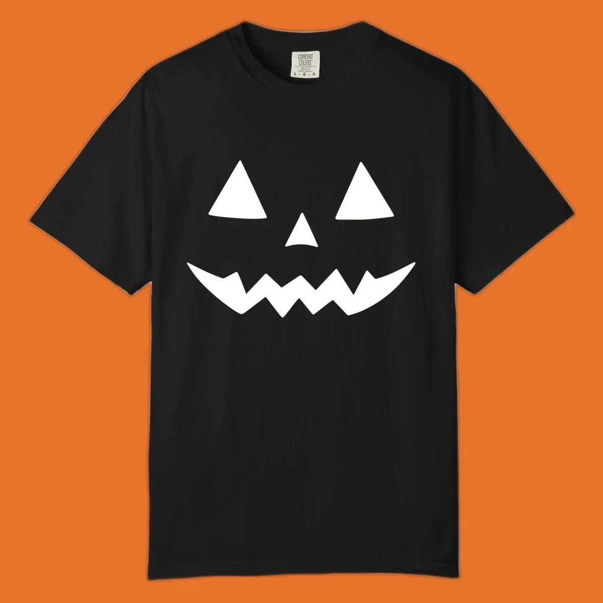 Classic jack-o-lantern face with triangle eyes and jagged mouth graphic.