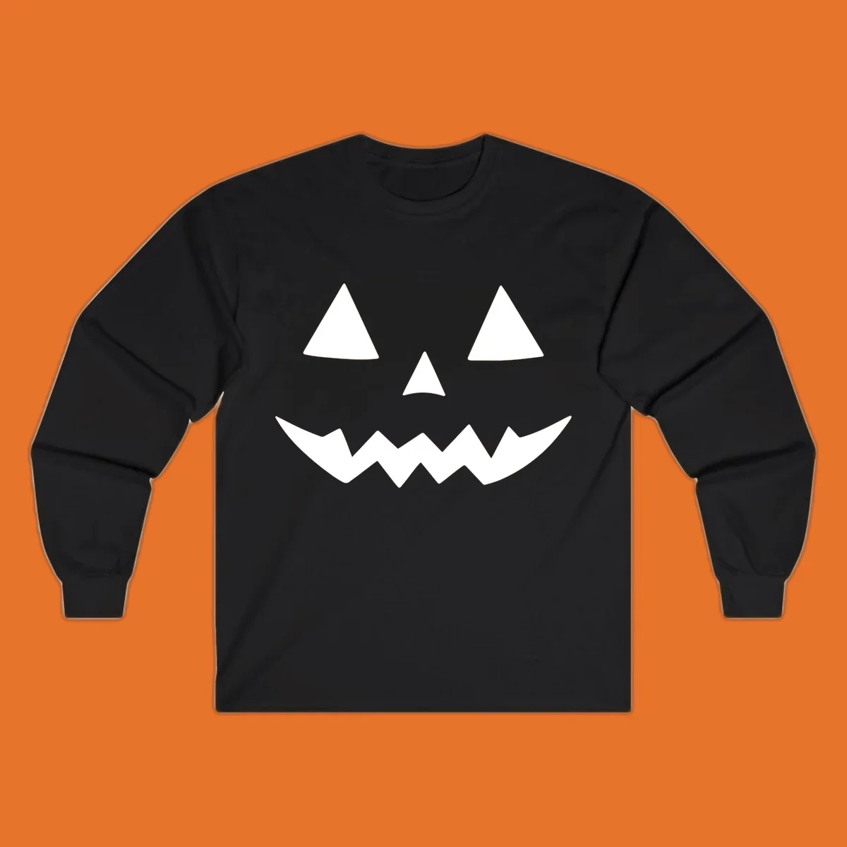 Classic jack-o-lantern face with triangle eyes and jagged mouth graphic.