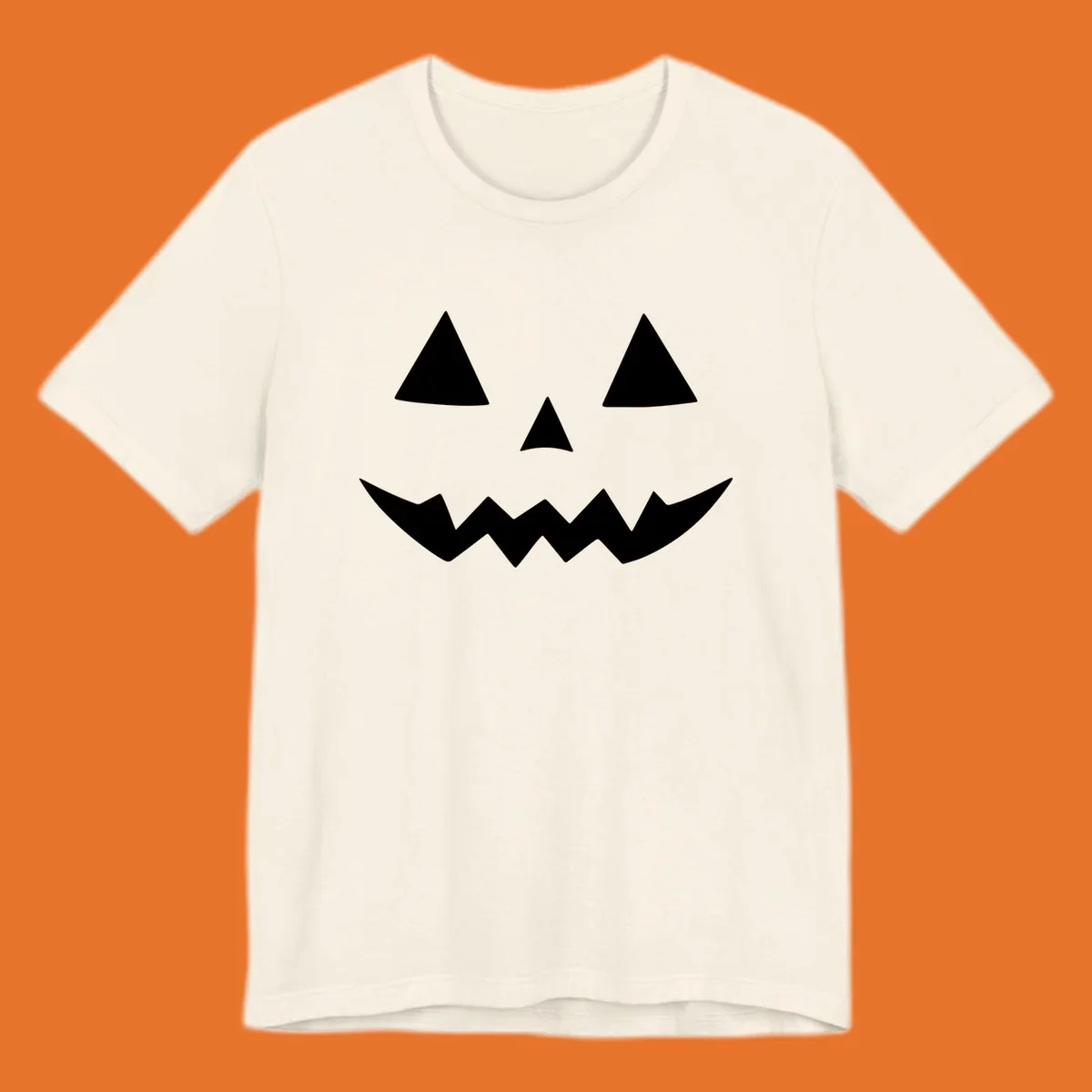 Classic jack-o-lantern face with triangle eyes and jagged mouth graphic.