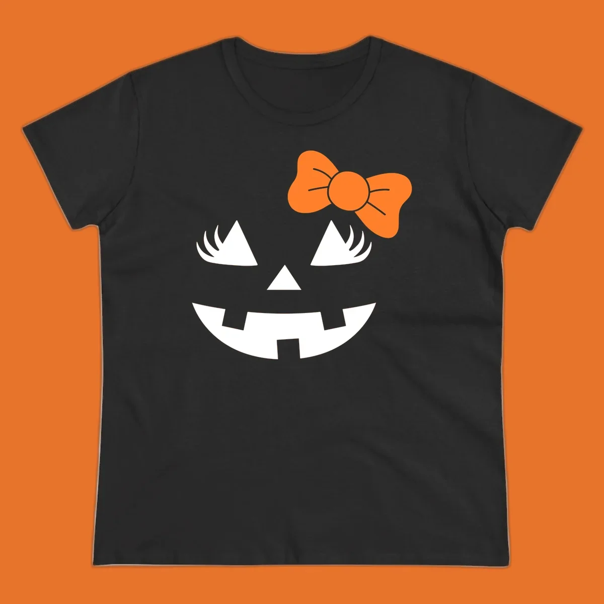 Cute halloween pumpkin face with an orange bow graphic