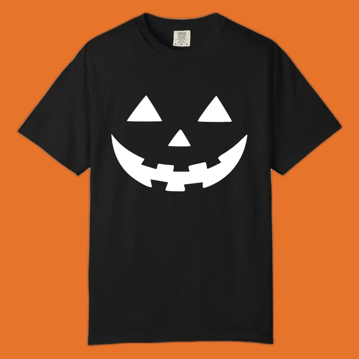 Classic jack o lantern face graphic with triangle eyes and jagged smile.