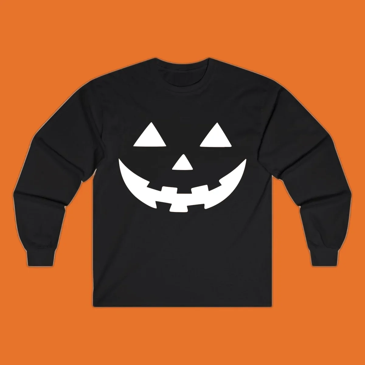 Classic jack o lantern face graphic with triangle eyes and jagged smile.