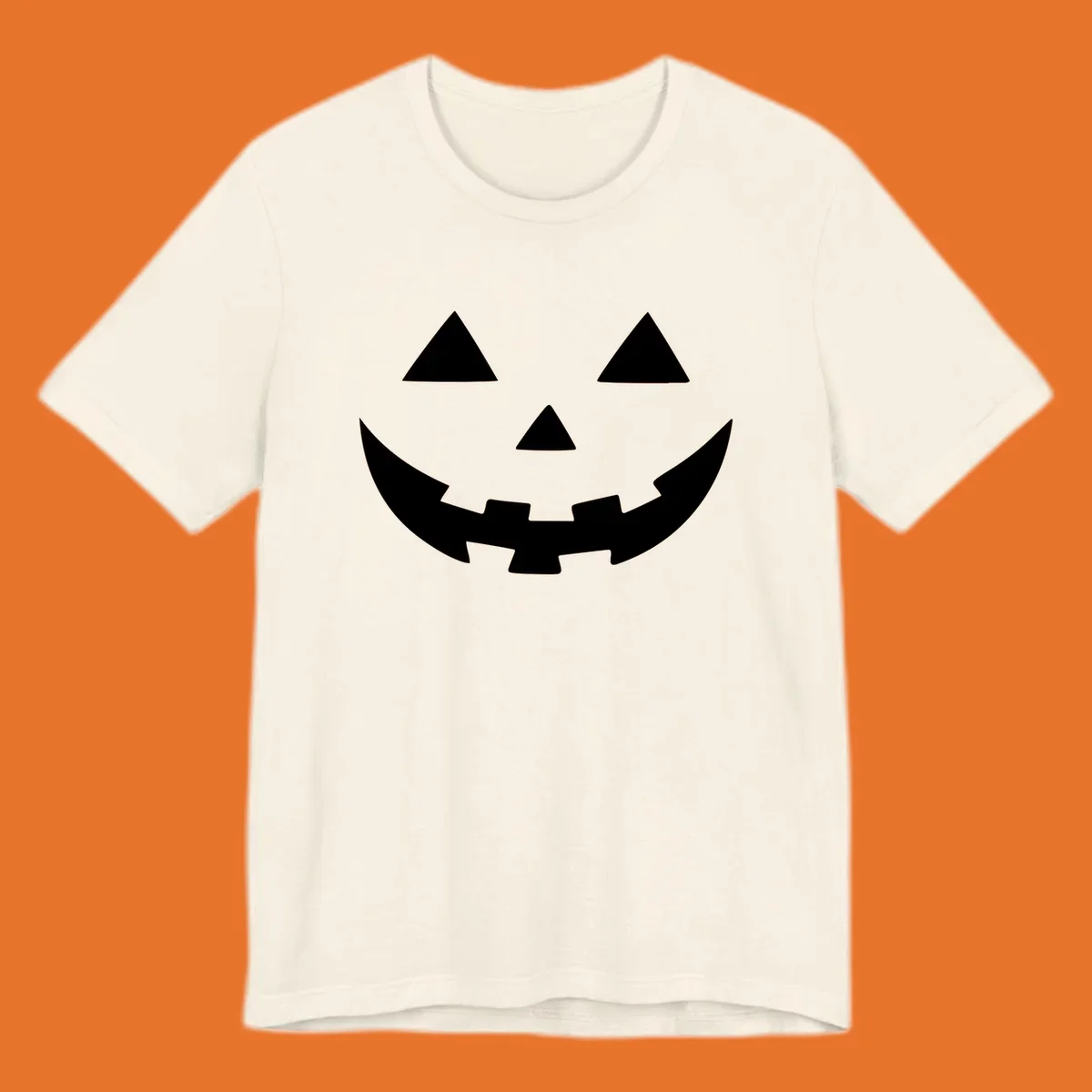 Classic jack o lantern face graphic with triangle eyes and jagged smile.