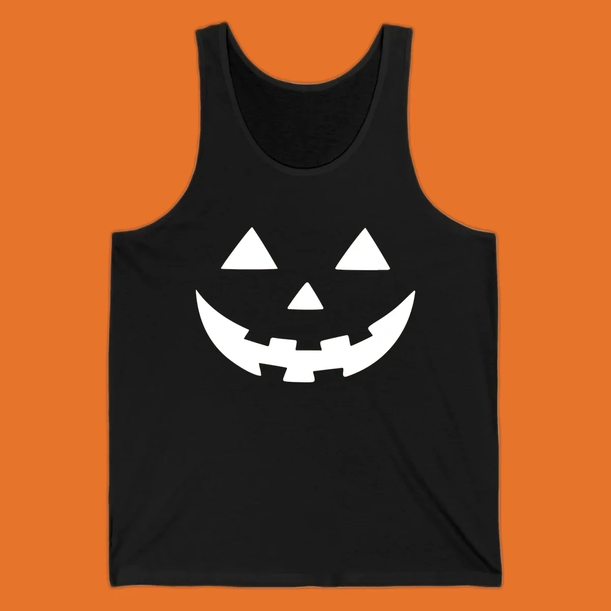 Classic jack o lantern face graphic with triangle eyes and jagged smile.