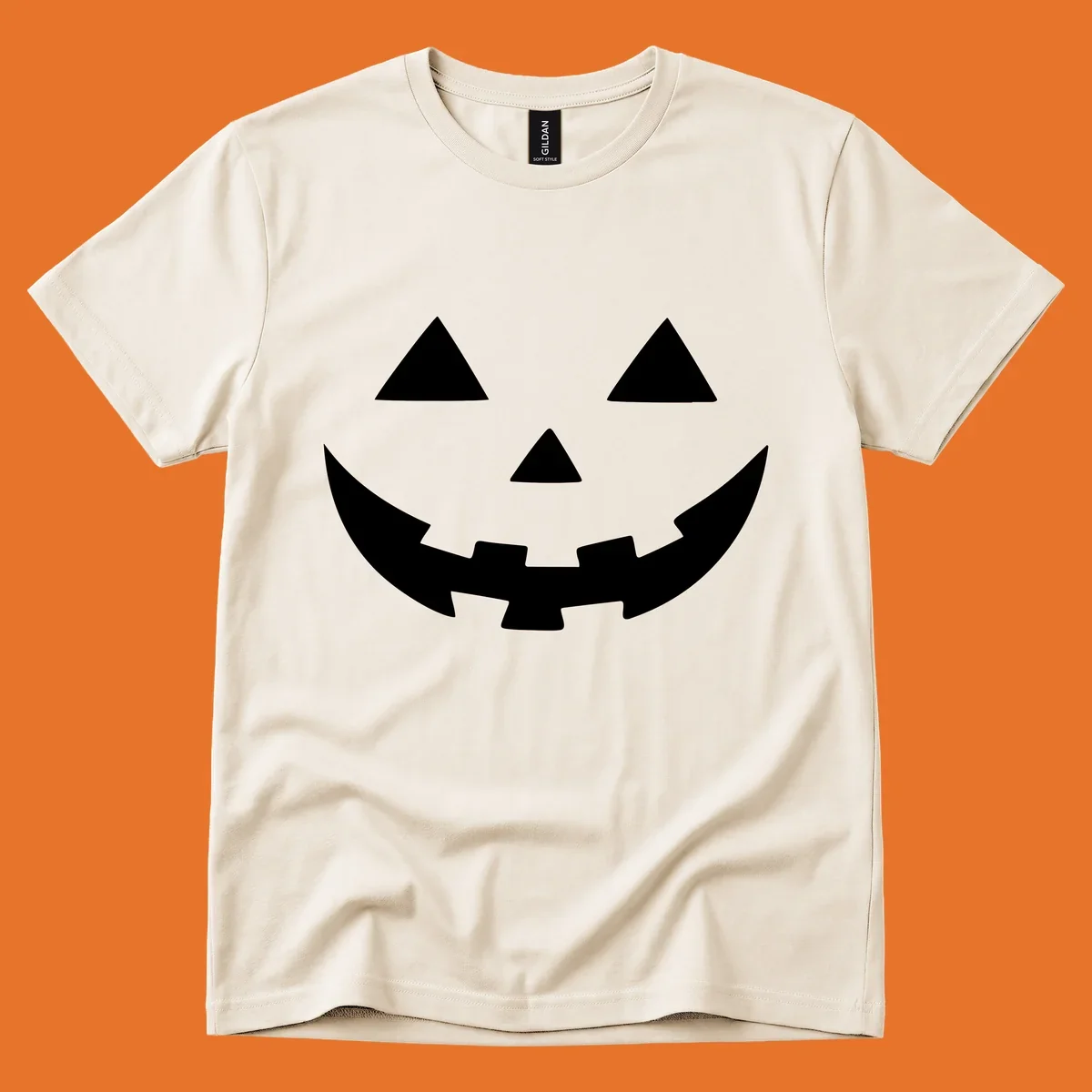Classic jack o lantern face graphic with triangle eyes and jagged smile.