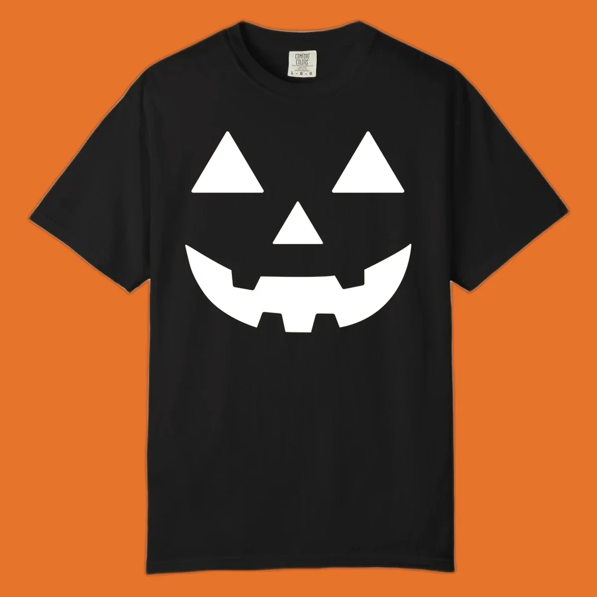 Classic Jack O' Lantern face with triangle eyes, nose, and jagged smile, rendered in white on black and black on white.