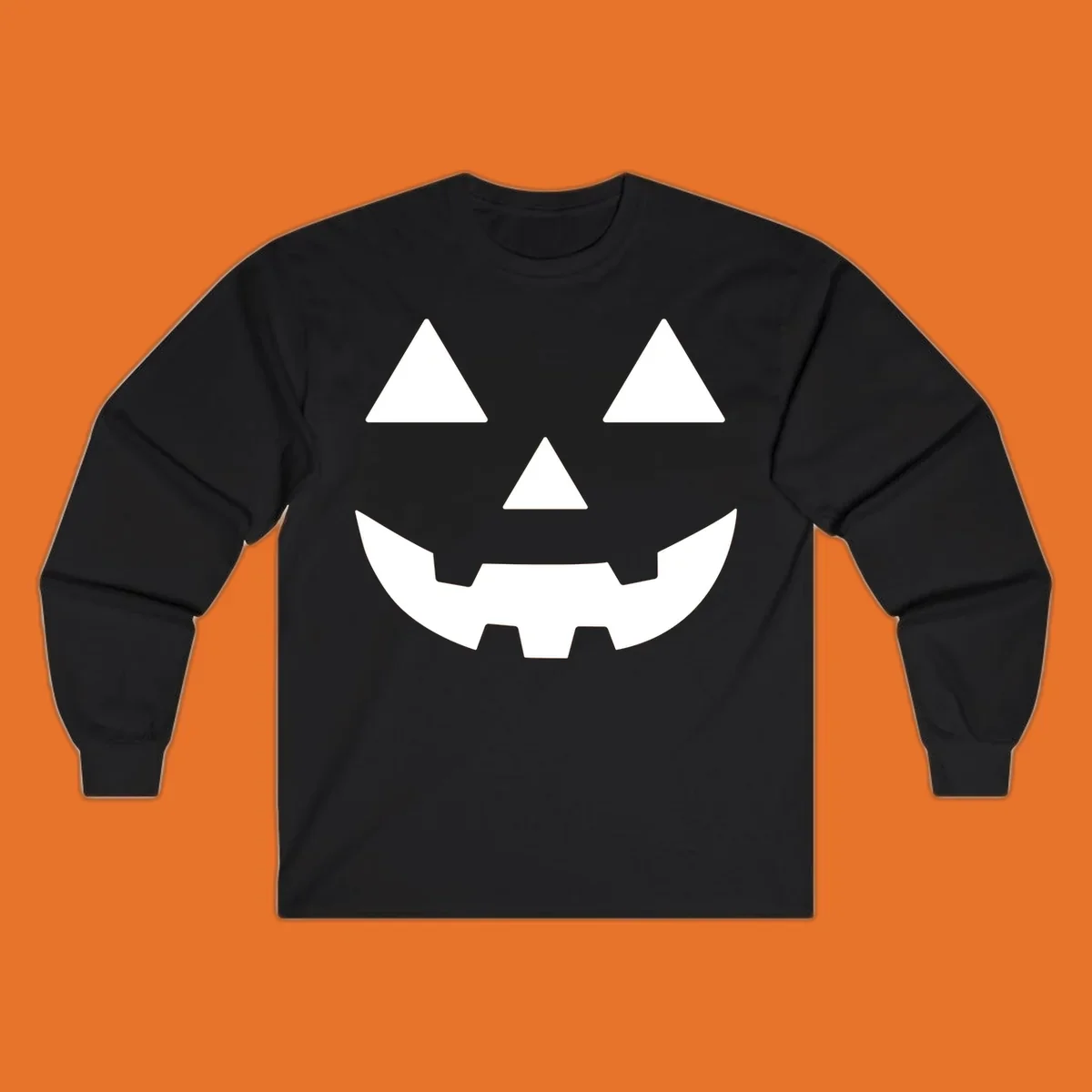Classic Jack O' Lantern face with triangle eyes, nose, and jagged smile, rendered in white on black and black on white.