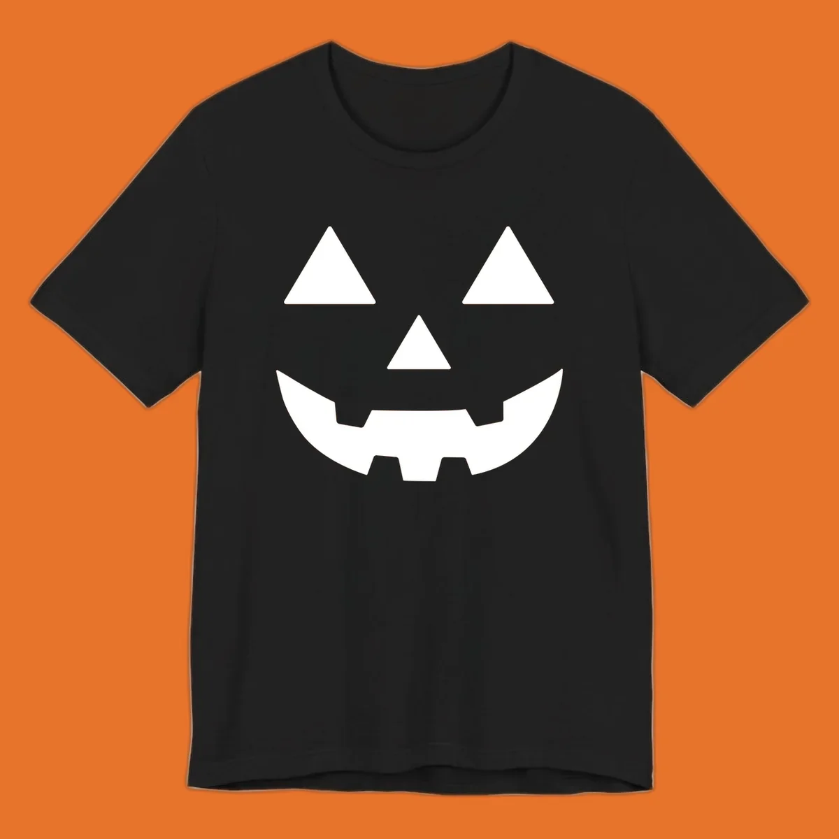 Classic Jack O' Lantern face with triangle eyes, nose, and jagged smile, rendered in white on black and black on white.