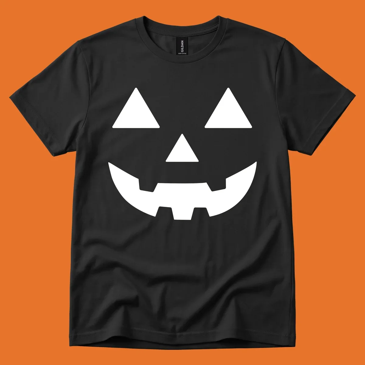 Classic Jack O' Lantern face with triangle eyes, nose, and jagged smile, rendered in white on black and black on white.