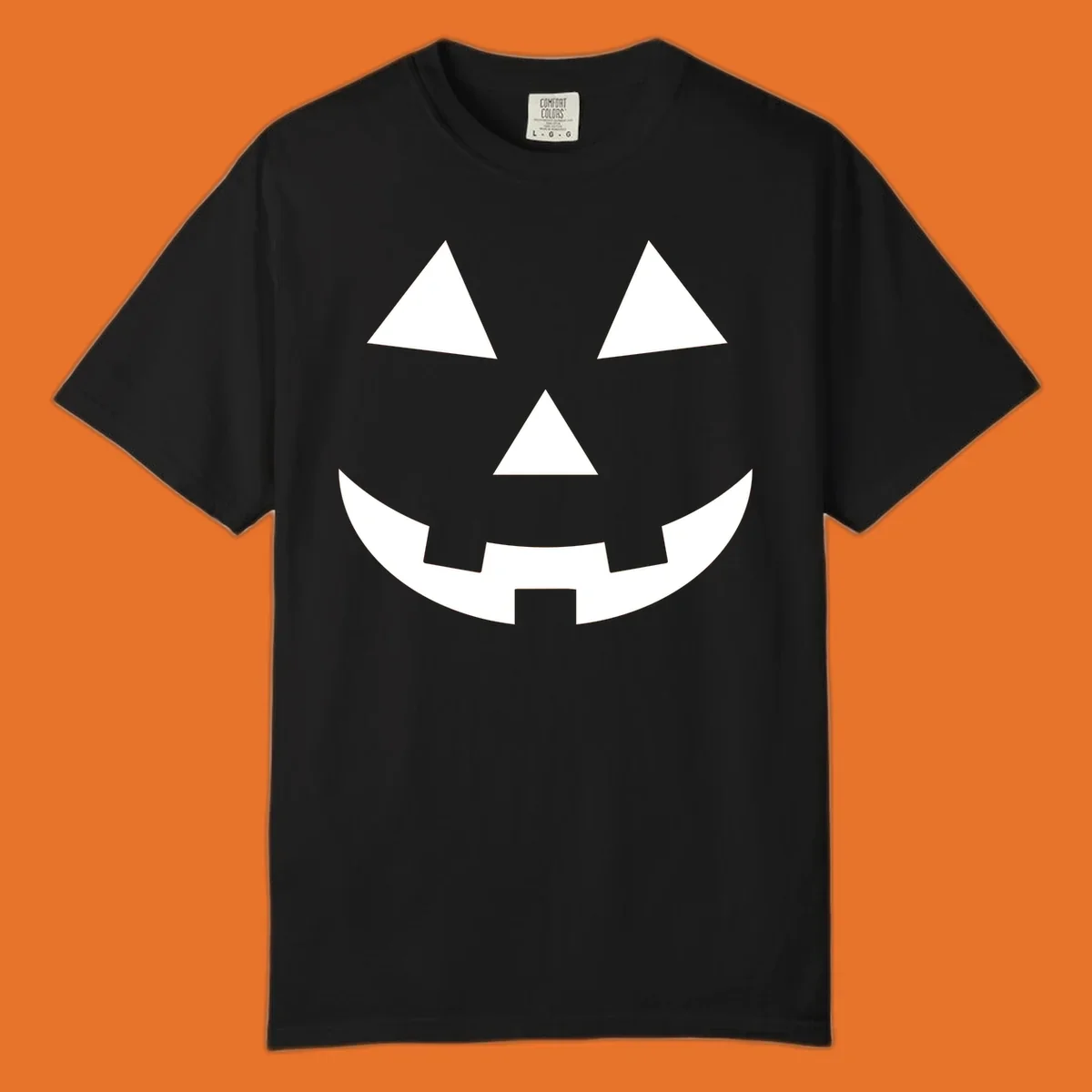 Classic jack o lantern face graphic with triangle eyes and jagged smile. Halloween design.