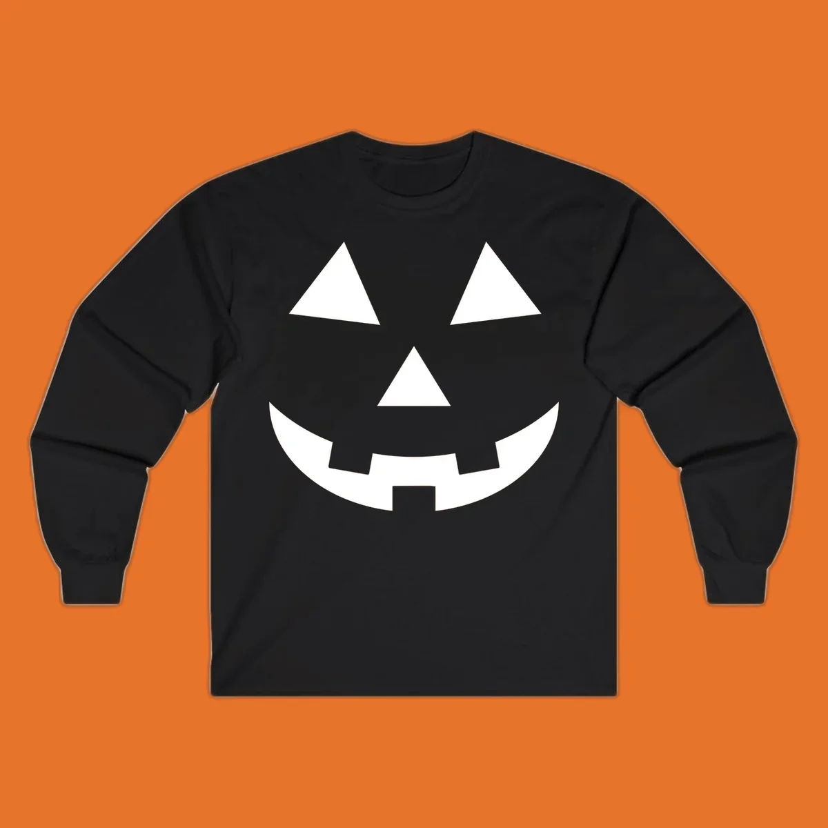 Classic jack o lantern face graphic with triangle eyes and jagged smile. Halloween design.