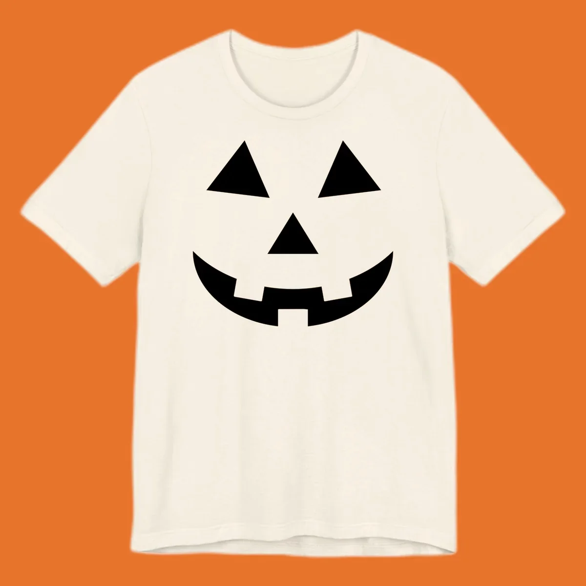 Classic jack o lantern face graphic with triangle eyes and jagged smile. Halloween design.