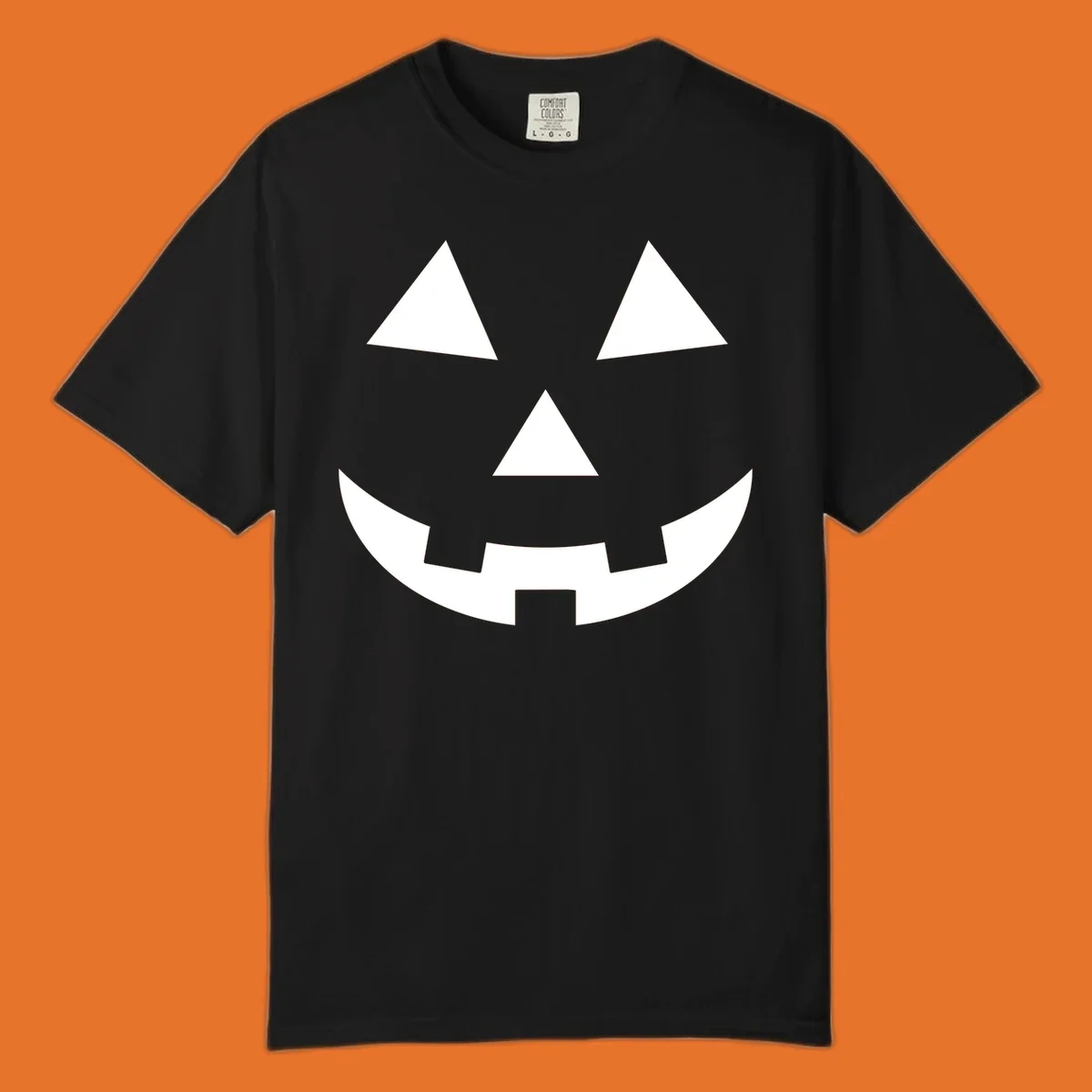 Classic jack-o-lantern face with triangle eyes and jagged smile. Halloween graphic.
