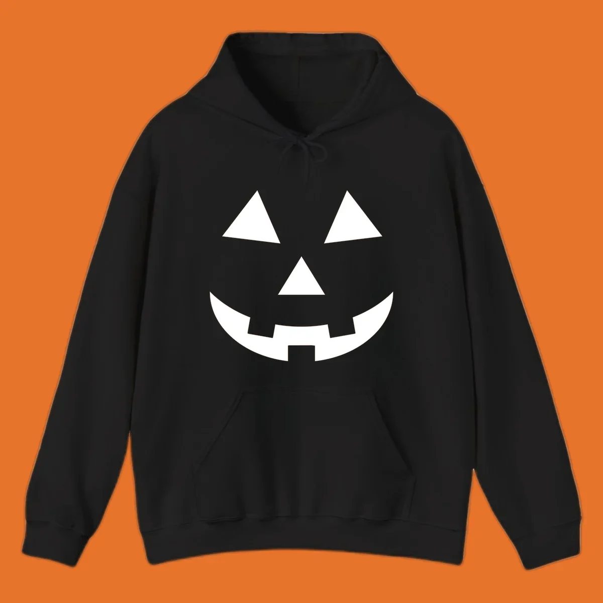 Classic jack-o-lantern face with triangle eyes and jagged smile. Halloween graphic.