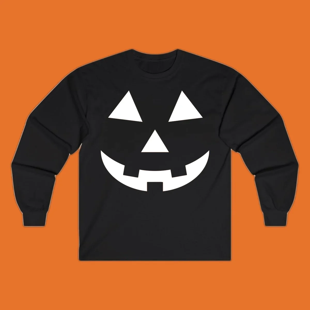 Classic jack-o-lantern face with triangle eyes and jagged smile. Halloween graphic.