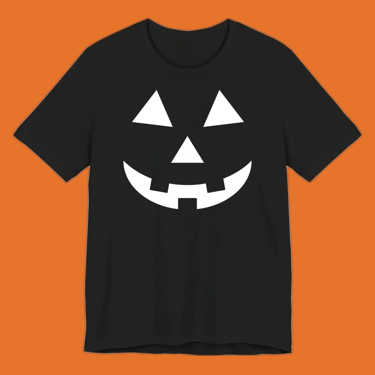 Classic jack-o-lantern face with triangle eyes and jagged smile. Halloween graphic.