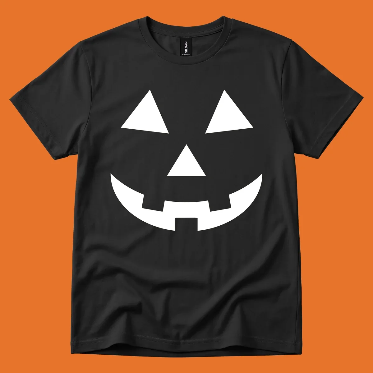 Classic jack-o-lantern face with triangle eyes and jagged smile. Halloween graphic.