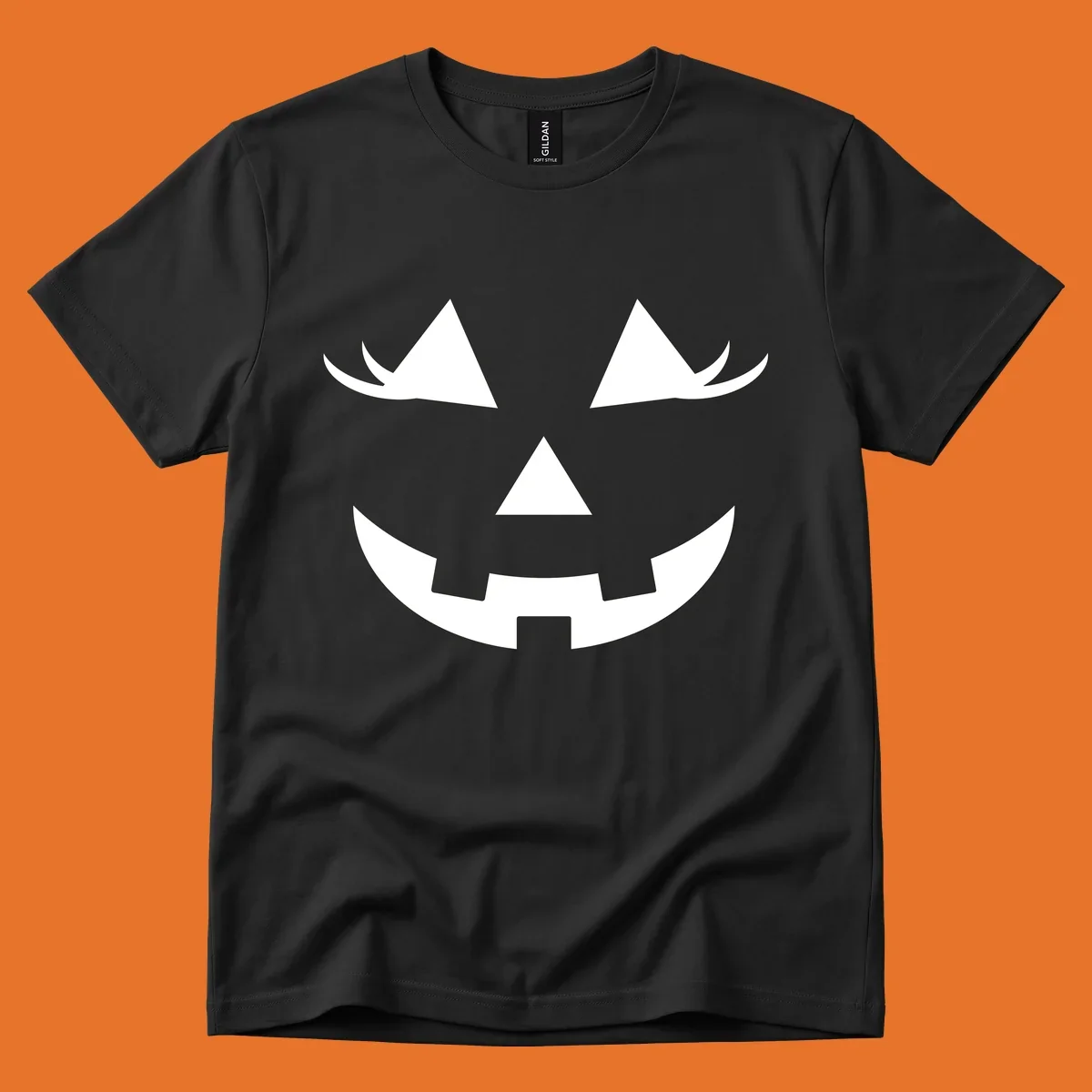 Jack o lantern face with triangular eyes and a jagged smile, classic halloween graphic.