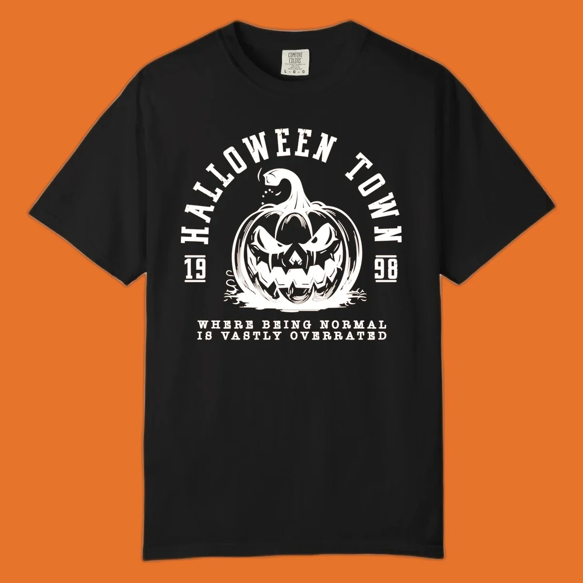 Halloween Town pumpkin illustration with text 'Where Being Normal Is Vastly Overrated'