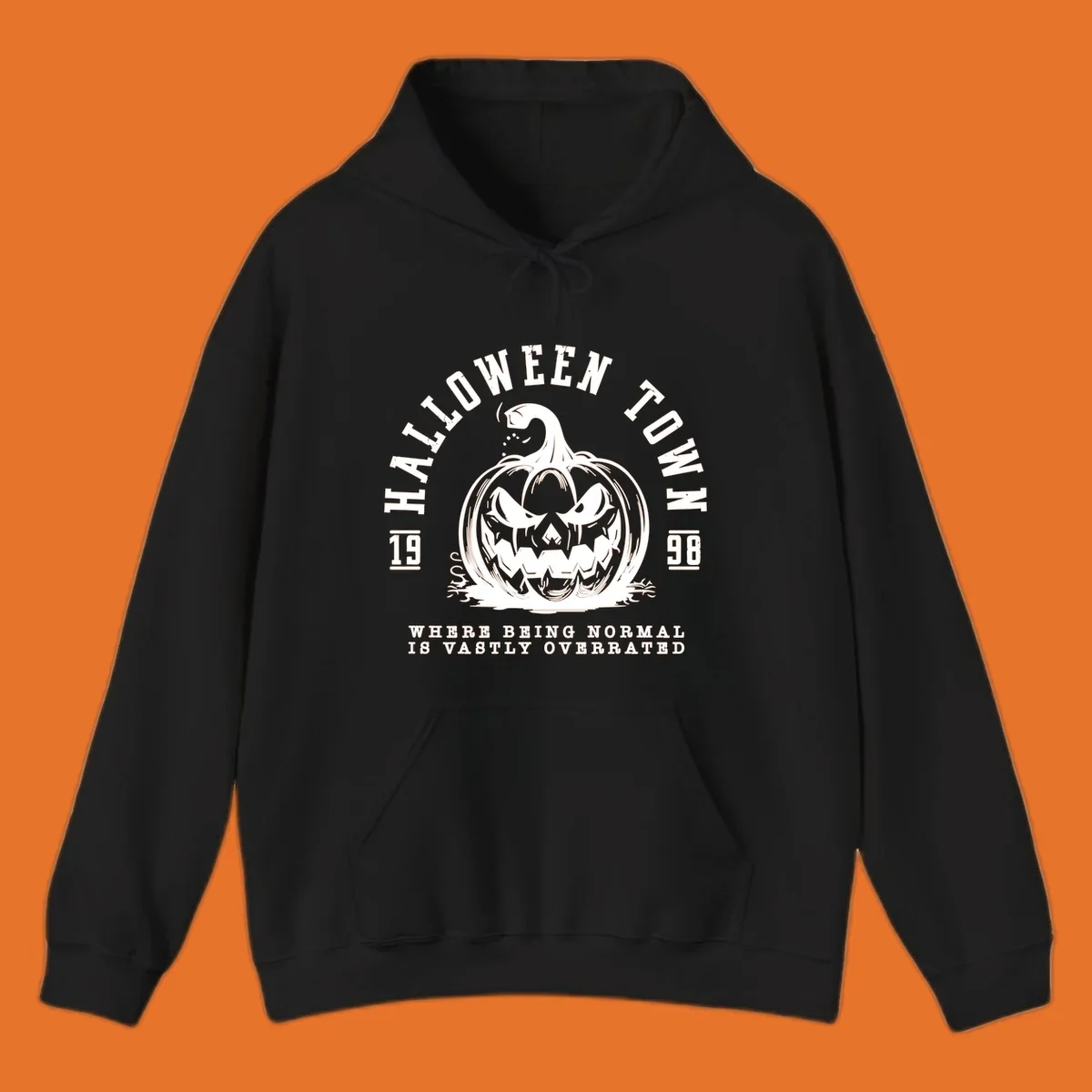 Halloween Town pumpkin illustration with text 'Where Being Normal Is Vastly Overrated'