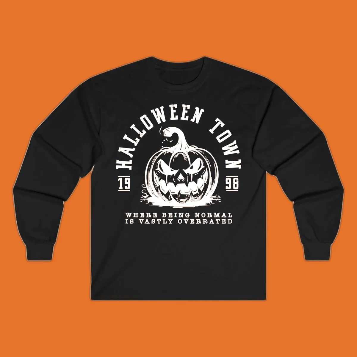 Halloween Town pumpkin illustration with text 'Where Being Normal Is Vastly Overrated'