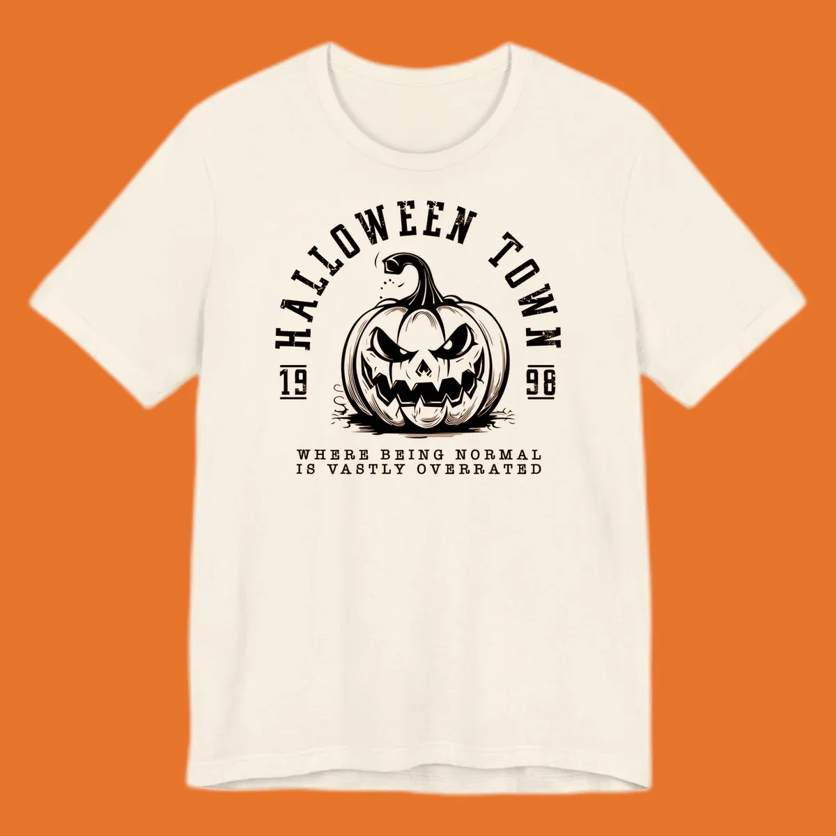 Halloween Town pumpkin illustration with text 'Where Being Normal Is Vastly Overrated'