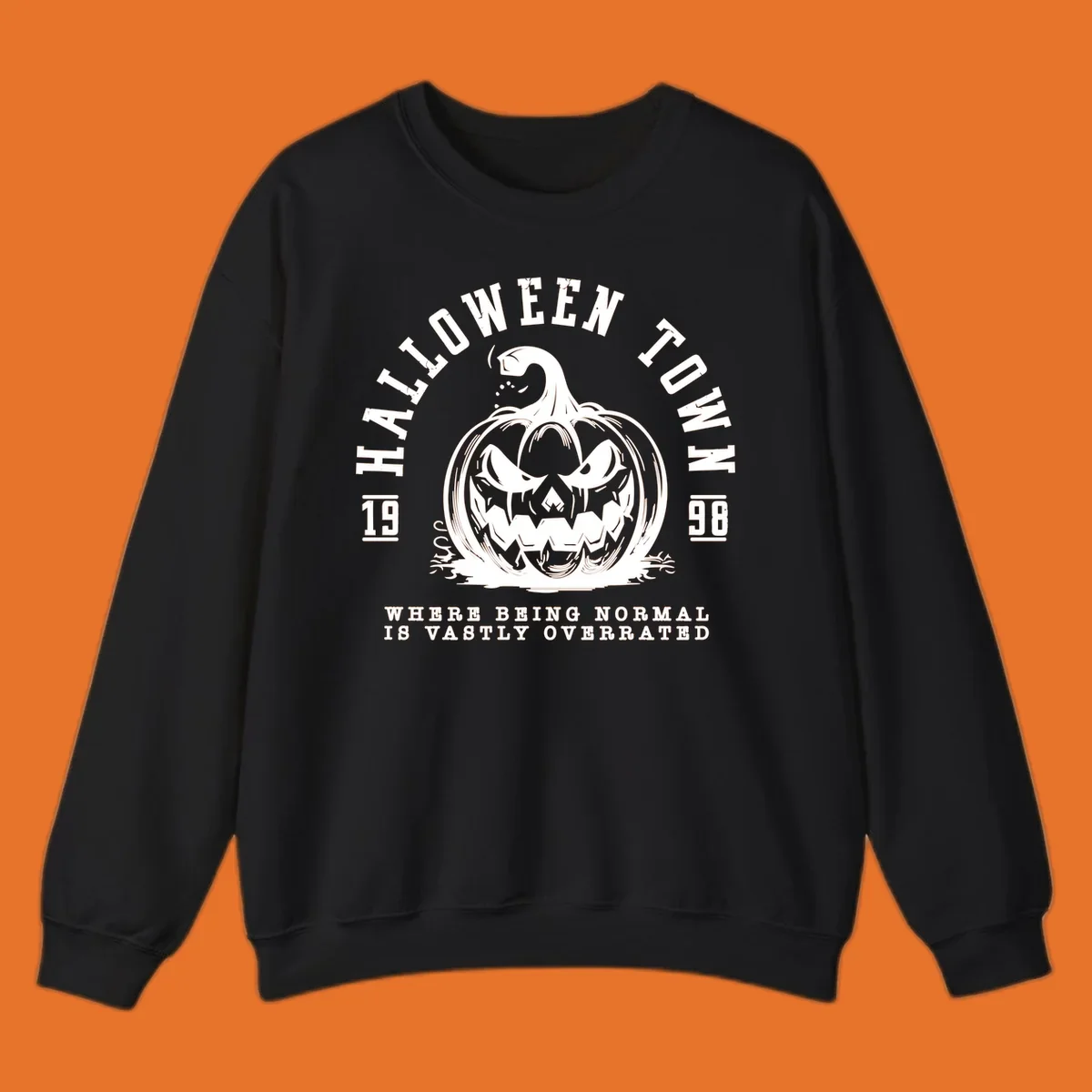 Halloween Town pumpkin illustration with text 'Where Being Normal Is Vastly Overrated'