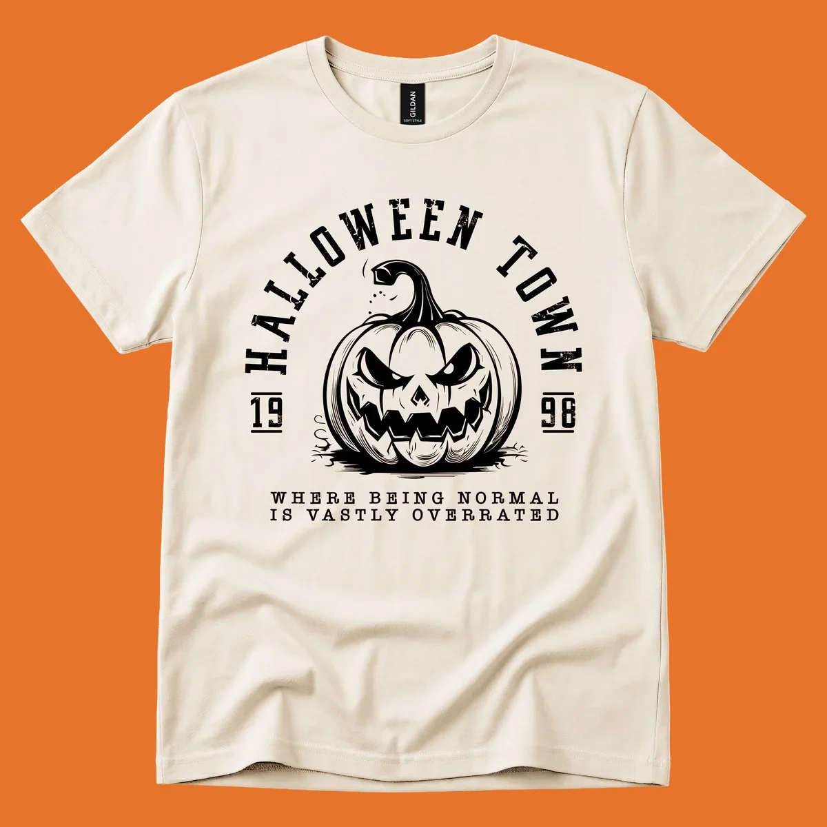 Halloween Town pumpkin illustration with text 'Where Being Normal Is Vastly Overrated'