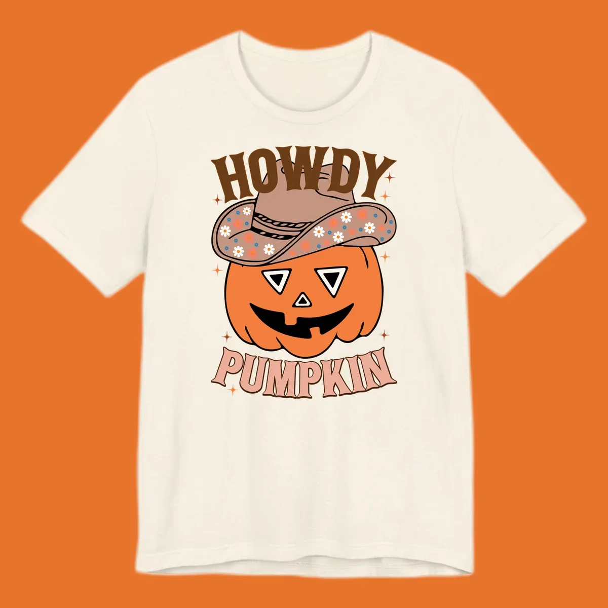 Howdy Pumpkin cowboy hat illustration for Halloween, with retro-style text and floral accents.